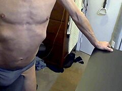 I’m grinding on a stool in grey briefs for muscle relief. Football helps ease my tension too.