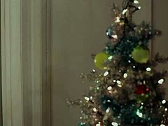 Two sexy brunettes spreading Christmas cheer all through the house