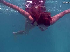 wow, redhead nikita vodorezova strips naked quick underwater in public