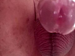 dude, this huge tattooed cock cums from anal fisting