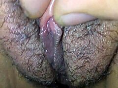Vagabunda shows close-up clit piercing in massage session
