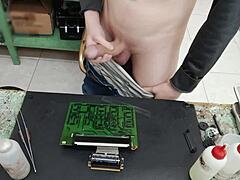 I shoot a huge cumshot on a client’s machine instead of repairing it.