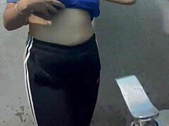 Student sneaks into hotel bathroom for wild action. What’s she doing with those oiled legs?
