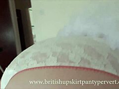 Upskirt view of 64yr old British milf, oops! Housewife in stockings flashes panties by mistake.
