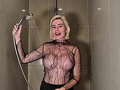 wow, this blonde’s huge tits in a see-through wet shower top... insane! 😍