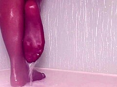 Hey, check these nylon feet getting wet in the shower! I can’t believe how sexy they look. So tempting!