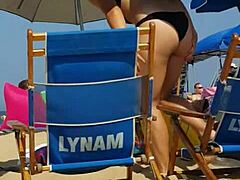 candid shots of this sneaky slut in bikini at beach