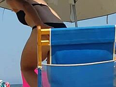 candid shots of this sneaky slut in bikini at beach
