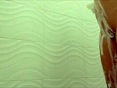 Latina Stepmom Caught on Camera Showering in Homemade Video Clip.