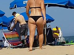 candid shots of this sneaky slut in bikini at beach