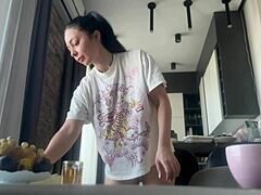 sexy fit brunette cleans house with no panties on