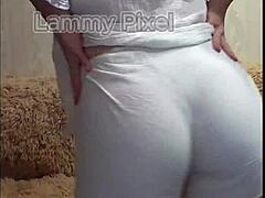 hey, check this horny brunette stripping and showing ass