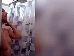 cute latina teen showering with wet body and sensual tattoo in steamy bathroom
