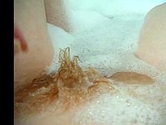 Annie Body soaks in bath with monster comfy bubbles