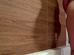 Bathroom camera catches mature wife with plump figure showering her curvy body. Watch this homemade pawg get wet!