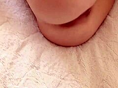 ah just look at this horny milf's shaved pussy in solo action