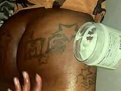 Oiled ebony petite gets big black cock doggystyle creampie after massage