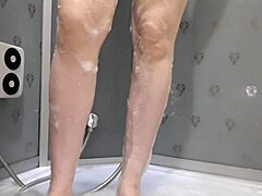 hot milf in the shower cums hard from a vibrator with her big tits and natural blonde assets!