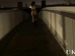 Why does Andrea love flashing her shaved pussy in public? This mature British wife gets off on outdoor nudity and wanking in Birmingham.