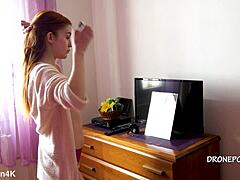 beautiful naked redhead karolinka from czech applies her makeup in a cute small tits display