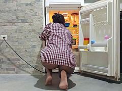 My neighbor cleans without a thong on, flashing her ass while I watch her sexy moves from sxhorny com.