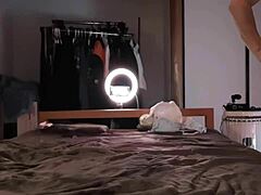 Amateur Japanese woman in stockings gives intense handjob leading to cum explosion.