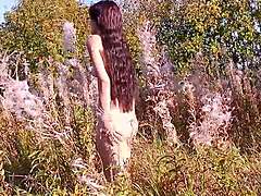 Beautiful brunette naked on abandoned island