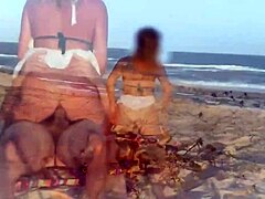 Blonde milf risks everything for intense anal riding on a crowded public beach
