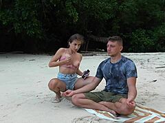 I suck a stranger's big dick on the beach