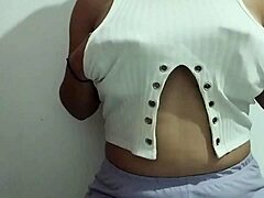 oh wow!! this milf's rubbing her big tits with such intense pleasure in a real homemade video!!!