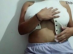 oh wow!! this milf's rubbing her big tits with such intense pleasure in a real homemade video!!!