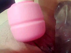 uh i was masturbating my swollen big pussy with this fat toy and massager. it felt so intense on my clit and cunt lips.