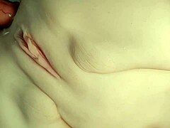 Close-up double penetration action with a cute shaved pussy fuck doll getting anal and handjob treatment from big toys in her ass.