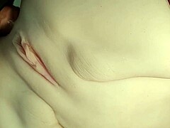 Close-up double penetration action with a cute shaved pussy fuck doll getting anal and handjob treatment from big toys in her ass.