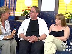 mmv films features petra offering some helpful assistance in a group setting with friends.