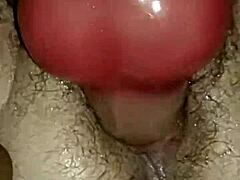 Curious how a BBW milf's hairy wet pussy faces intense fisting close-up