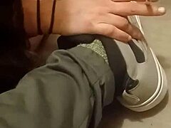 Detailed Scene of Friend Trashing Sneakers and Shoes with Feet Involved.