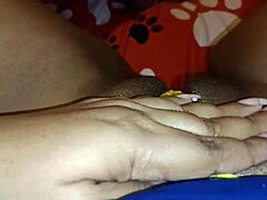 Alone at home, I indulge in a soothing personal moment.