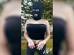 Horny shemale gets off masturbating with big tits and ass in public park crossdressing show
