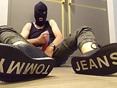 wank in sneakers with intriguing sneaker focus