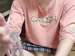 shemale ting xuan gives a blowjob to dildo, showing feet and upskirt in asian chinese style with cum in mouth