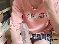 shemale ting xuan gives a blowjob to dildo, showing feet and upskirt in asian chinese style with cum in mouth