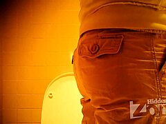 Beautiful girl shows hair on her pussy while peeing standing up in hidden toilet cam.