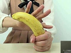 Watch this Asian girl crush a banana by hand in intense fetish style!