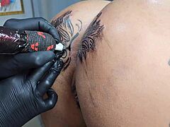 Whoa, check out how I'm modifying the tattoo around my ass - it's way bigger now than before!