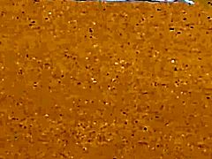 Pink princess struts on the beach with hidden candid vibes, contrasting her ass against the waves in intriguing princess style.