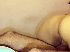 Arab woman expresses passion during intimate bedroom encounter