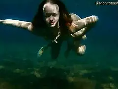 Hot Spanish babe, are you swimming like a mermaid at the beach?