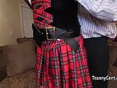 Black guy dominates uniform tranny.