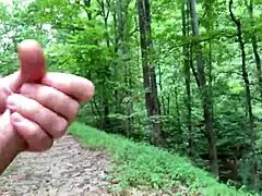 Curved cock explodes with cum on public trail